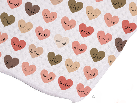 Hearts & Baps Tea Towel – a funny, vibrant, and cheeky kitchen towel featuring a bold and playful design.